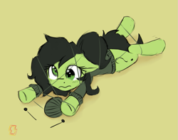 Size: 817x645 | Tagged: safe, artist:zebra, oc, oc only, oc:filly anon, blushing, derp, female, filly, green background, knitting, knitting needles, lying down, simple background, solo, stuck, wavy mouth