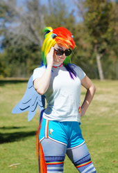 Size: 1019x1500 | Tagged: safe, imported from derpibooru, rainbow dash, human, clothes, cosplay, costume, irl, irl human, multicolored hair, photo, rainbow hair, solo, sunglasses