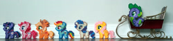 Size: 3340x800 | Tagged: safe, artist:kuren247, imported from derpibooru, applejack, fluttershy, pinkie pie, rainbow dash, rarity, spike, twilight sparkle, alicorn, earth pony, pegasus, pony, unicorn, christmas, holiday, irl, mane seven, mane six, merry christmas, miniature, perler beads, photo, photography, sleigh