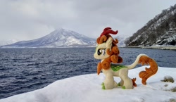 Size: 2048x1188 | Tagged: safe, imported from derpibooru, photographer:pakapaka1993, autumn blaze, kirin, pony, irl, japan, mountain, ocean, photo, plushie, snow, solo, water, winter