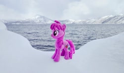Size: 1024x605 | Tagged: safe, imported from derpibooru, photographer:pakapaka1993, berry punch, berryshine, earth pony, pony, irl, japan, mountain, ocean, photo, plushie, snow, solo, water, winter