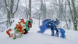 Size: 1024x586 | Tagged: safe, artist:lanacraft, imported from derpibooru, photographer:pakapaka1993, autumn blaze, cinder glow, summer flare, alicorn, kirin, pony, irl, japan, photo, plushie, snow, snowfall, tree, trio, winter