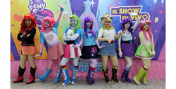 Size: 630x320 | Tagged: safe, imported from derpibooru, applejack, fluttershy, pinkie pie, rainbow dash, rarity, sunset shimmer, twilight sparkle, human, equestria girls, boots, clothes, compression shorts, cosplay, costume, denim skirt, eqg el show en vivo, humane five, humane six, irl, irl human, live action, photo, pleated skirt, shoes, shorts, skirt, theater