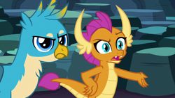 Size: 1280x720 | Tagged: safe, imported from derpibooru, screencap, gallus, smolder, dragon, griffon, uprooted, dragoness, female, gallus is not amused, hand on hip, male, smolder is not amused, unamused