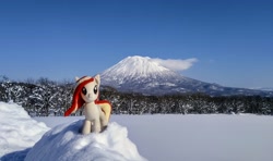 Size: 2048x1212 | Tagged: safe, imported from derpibooru, photographer:pakapaka1993, oc, oc only, oc:poniko, earth pony, pony, cloud, earth pony oc, irl, japan, mountain, photo, plushie, snow, solo, tree, winter