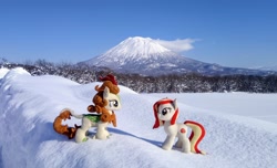 Size: 2048x1249 | Tagged: safe, imported from derpibooru, photographer:pakapaka1993, autumn blaze, oc, oc only, oc:poniko, earth pony, kirin, pony, cloud, duo, earth pony oc, irl, japan, mountain, photo, plushie, snow, tree, winter