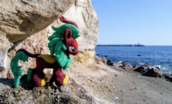 Size: 2048x1237 | Tagged: safe, imported from derpibooru, photographer:pakapaka1993, cinder glow, summer flare, kirin, pony, irl, japan, ocean, photo, plushie, rock, solo, water