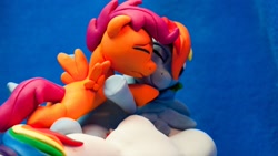 Size: 1024x576 | Tagged: safe, artist:dustysculptures, imported from derpibooru, rainbow dash, scootaloo, pegasus, pony, butt, cloud, craft, duo, hug, photo, plot, scootabutt, sculpture