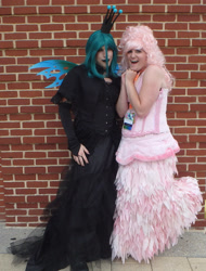 Size: 1969x2592 | Tagged: safe, artist:flufflepam, imported from derpibooru, queen chrysalis, oc, oc:fluffle puff, human, brick wall, changeling wings, clothes, cosplay, costume, dress, duo, irl, irl human, photo, queen chrysalis' crown, wings