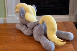 Size: 1280x854 | Tagged: safe, artist:azgchip, imported from derpibooru, derpy hooves, pegasus, pony, commission, dock, female, irl, lying down, mare, photo, plushie, rear view, solo, tail