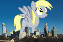 Size: 1920x1282 | Tagged: safe, artist:freak0uo, artist:thegiantponyfan, imported from derpibooru, derpy hooves, pegasus, pony, charlotte, derp, derpyzilla, female, giant derpy hooves, giant pegasus, giant pony, giantess, highrise ponies, irl, macro, mare, mega giant, north carolina, photo, ponies in real life, smiling, spread wings, walking, wings