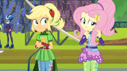 Size: 3410x1920 | Tagged: safe, imported from derpibooru, screencap, applejack, fluttershy, lemon zest, sunny flare, equestria girls, friendship games, duo, duo female, duo focus, female, goggles, helmet, high res, offscreen character, roller skates