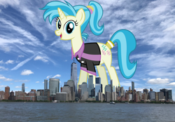 Size: 2100x1465 | Tagged: safe, artist:thegiantponyfan, artist:vladimirmacholzraum, imported from derpibooru, allie way, pony, unicorn, clothes, female, giant pony, giant unicorn, giantess, highrise ponies, irl, looking at you, macro, manhattan, mare, mega giant, new york, new york city, open mouth, open smile, photo, ponies in real life, smiling, smiling at you