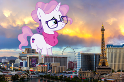 Size: 1244x829 | Tagged: safe, artist:dragonchaser123, artist:thegiantponyfan, imported from derpibooru, raspberry latte, pony, unicorn, ear piercing, earring, female, giant pony, giant unicorn, giantess, glasses, highrise ponies, irl, jewelry, las vegas, macro, mare, mega giant, nevada, photo, piercing, ponies in real life, smiling