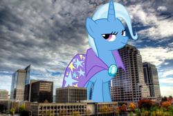 Size: 2048x1365 | Tagged: safe, artist:jeatz-axl, artist:thegiantponyfan, imported from derpibooru, trixie, pony, unicorn, brooch, california, cape, clothes, female, giant pony, giant unicorn, giantess, highrise ponies, irl, jewelry, looking at you, macro, mare, mega giant, mega trixie, photo, ponies in real life, sacramento, smiling, smiling at you, trixie's brooch, trixie's cape