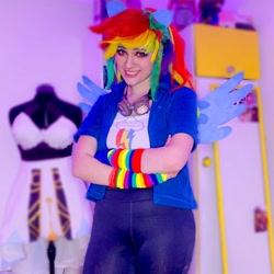 Size: 1080x1080 | Tagged: safe, imported from derpibooru, rainbow dash, human, clothes, cosplay, costume, crossed arms, cutie mark on clothes, goggles, irl, irl human, multicolored hair, photo, rainbow hair, solo