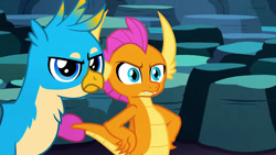 Size: 1920x1080 | Tagged: safe, imported from derpibooru, screencap, gallus, smolder, dragon, griffon, uprooted, dragoness, female, gallus is not amused, hand on hip, male, smolder is not amused, unamused