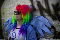 Size: 2000x1333 | Tagged: safe, artist:shadeila, imported from derpibooru, rainbow dash, human, 2015, clothes, cosplay, costume, irl, irl human, multicolored hair, photo, rainbow hair, solo, sunglasses
