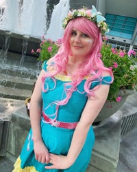 Size: 1080x1350 | Tagged: safe, artist:sweetalissum, imported from derpibooru, fluttershy, human, equestria girls, clothes, cosplay, costume, floral head wreath, flower, fountain, irl, irl human, photo, solo, wondercon