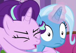 Size: 871x615 | Tagged: safe, imported from derpibooru, screencap, starlight glimmer, trixie, pony, unicorn, all bottled up, cropped, duo, eyes closed, female, glomp, hug, magic, magic aura, mare, out of context, tackle, wide eyes