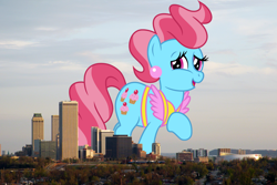 Size: 3648x2441 | Tagged: safe, artist:jeatz-axl, artist:thegiantponyfan, imported from derpibooru, cup cake, earth pony, pony, female, giant pony, giant/macro earth pony, giantess, high res, highrise ponies, irl, looking at you, macro, mare, mega giant, oklahoma, open mouth, photo, ponies in real life, raised hoof, smiling, story included, tulsa