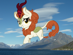 Size: 3600x2700 | Tagged: safe, artist:jhayarr23, artist:thegiantponyfan, imported from derpibooru, autumn blaze, kirin, butt, female, giant autumn blaze, giant kirin, giantess, high res, highrise ponies, irl, looking at you, macro, mega giant, mountain, mountain range, photo, plot, ponies in real life, smiling