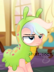 Size: 720x960 | Tagged: safe, artist:pikri bocil, imported from derpibooru, oc, oc:rain storm, earth pony, pony, colt, cute, doll, foal, male, solo, toy, unamused, watermark