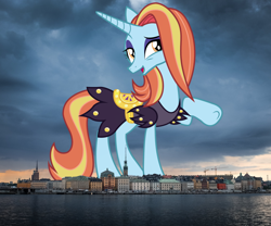 Size: 2048x1700 | Tagged: safe, artist:koolfrood, artist:thegiantponyfan, imported from derpibooru, sassy saddles, pony, unicorn, clothes, female, giant pony, giant unicorn, giantess, highrise ponies, irl, looking at you, macro, mare, mega giant, open mouth, open smile, photo, ponies in real life, raised hoof, skyline, smiling, solo, stockholm, sweden