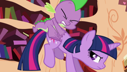 Size: 1920x1080 | Tagged: safe, imported from derpibooru, screencap, spike, twilight sparkle, dragon, pony, unicorn, season 2, the cutie pox, bucking, female, golden oaks library, male, mare, out of context, pain, unicorn twilight