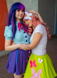 Size: 1468x2006 | Tagged: safe, artist:jadechancosplay, artist:mauscosplay, imported from derpibooru, fluttershy, twilight sparkle, human, equestria girls, clothes, cosplay, costume, duo, hug, irl, irl human, photo