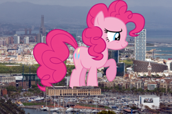 Size: 1800x1196 | Tagged: safe, artist:dashiesparkle, artist:thegiantponyfan, imported from derpibooru, pinkie pie, earth pony, pony, barcelona, female, giant pinkie pie, giant pony, giant/macro earth pony, giantess, highrise ponies, irl, macro, mare, mega giant, photo, ponies in real life, raised hoof, smiling, solo, spain