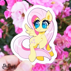 Size: 656x656 | Tagged: safe, artist:piripaints, imported from derpibooru, fluttershy, pegasus, pony, cute, ear fluff, flower, hand, irl, one leg raised, photo, shyabetes, spread wings, wings