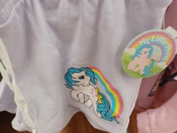 Size: 4000x3000 | Tagged: safe, imported from derpibooru, tootsie, earth pony, pony, blue hair, blue mane, bow, clothes, g1, hair bow, irl, looking at you, merchandise, my little pony logo, pants, photo, ponytail, solo, walmart