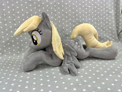 Size: 1280x960 | Tagged: safe, artist:kazzysart, imported from derpibooru, derpy hooves, pony, irl, lying down, photo, plushie, prone, solo