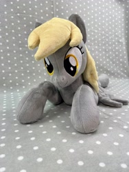 Size: 3024x4032 | Tagged: safe, artist:kazzysart, imported from derpibooru, derpy hooves, pony, irl, lying down, photo, plushie, prone, solo