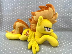 Size: 4032x3024 | Tagged: safe, artist:kazzysart, imported from derpibooru, spitfire, pony, irl, lying down, photo, plushie, prone, solo