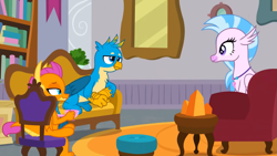 Size: 1397x786 | Tagged: safe, edit, edited screencap, imported from derpibooru, screencap, gallus, silverstream, smolder, dragon, griffon, hippogriff, the point of no return, chair, couch, cup, female, male, teacup, trio