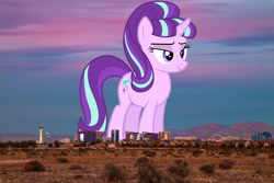 Size: 6000x4000 | Tagged: safe, artist:dashiesparkle edit, artist:thegiantponyfan, edit, imported from derpibooru, starlight glimmer, pony, unicorn, absurd file size, absurd resolution, female, giant pony, giant starlight glimmer, giant unicorn, giantess, highrise ponies, irl, las vegas, lidded eyes, macro, mare, mega giant, nevada, photo, ponies in real life, smiling