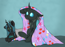 Size: 4040x2928 | Tagged: safe, artist:rokosmith26, imported from derpibooru, queen chrysalis, oc, oc:tarsi, changeling, blanket, changeling horn, changeling oc, commission, floppy ears, horn, looking up, male, plushie, sitting, smiling, solo, stallion, ych result