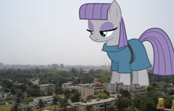 Size: 1024x656 | Tagged: safe, artist:chrzanek97, artist:thegiantponyfan, imported from derpibooru, maud pie, earth pony, pony, female, giant pony, giant/macro earth pony, giantess, highrise ponies, irl, looking down, macro, mare, mega giant, nigeria, photo, ponies in real life