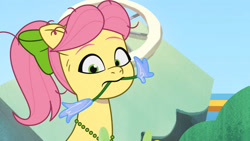 Size: 3410x1920 | Tagged: safe, imported from derpibooru, screencap, earth pony, pony, spoiler:g5, spoiler:my little pony: tell your tale, spoiler:tyts01e13, dumpster diving, female, flower, g5, high res, mare, mouth hold, my little pony: tell your tale, posey bloom, solo