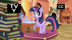 Size: 1334x750 | Tagged: safe, imported from derpibooru, screencap, twilight sparkle, pony, unicorn, season 3, spike at your service, book, female, golden oaks library, mare, open mouth, open smile, pillow, smiling, solo, standing on two hooves, table, tv rating, tv-y, unicorn twilight