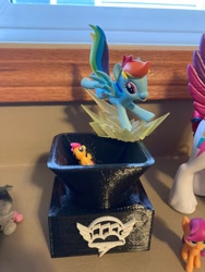 Size: 3024x4032 | Tagged: safe, imported from derpibooru, rainbow dash, scootaloo, sunny starscout, zipp storm, earth pony, pegasus, pony, fanfic:rainbow factory, 3d print, abuse, dark comedy, fanfic art, figurine, g5, irl, pegasus device, photo, scootabuse