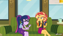 Size: 640x360 | Tagged: safe, imported from derpibooru, screencap, sci-twi, sunset shimmer, twilight sparkle, human, equestria girls, equestria girls series, text support, animated, boots, bowtie, cellphone, clothes, cutie mark on clothes, duo, duo female, eyes closed, female, geode of empathy, geode of telekinesis, gif, gifs.com, glasses, jewelry, leather, leather boots, leather vest, magical geodes, mug, necklace, open mouth, phone, ponytail, shoes, smartphone, smiling, text support: sunset shimmer