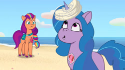Size: 3410x1920 | Tagged: safe, imported from derpibooru, screencap, izzy moonbow, sunny starscout, earth pony, pony, unicorn, spoiler:g5, spoiler:my little pony: tell your tale, spoiler:tyts01e18, :o, beach, duo, female, g5, high res, horn, horn impalement, izzy impaling things, mare, my little pony: tell your tale, on your cutie marks, open mouth, referee, referee sunny starscout, sports, sunny's referee whistle, unicorn problems, volleyball, whistle, whistle necklace, youtube link