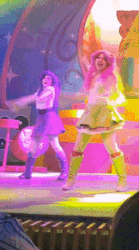 Size: 204x367 | Tagged: safe, edit, imported from derpibooru, fluttershy, rarity, human, equestria girls, animated, ass, butt, clothes, cropped, dancing, dancity, duo, eqg el show en vivo, gif, irl, irl human, legs, live action, panties, panty shot, skirt, underwear, upskirt, white underwear