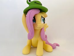 Size: 1280x960 | Tagged: safe, artist:sparkle40559933, imported from derpibooru, fluttershy, frog, pegasus, pony, craft, hat, photo, sculpture, smiling, solo, spread wings, wings