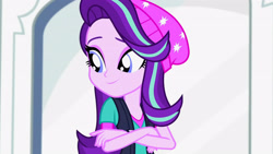 Size: 3410x1920 | Tagged: safe, imported from derpibooru, screencap, starlight glimmer, human, equestria girls, mirror magic, spoiler:eqg specials, beanie, crossed arms, female, hat, high res, smiling, solo, statue