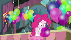 Size: 1000x563 | Tagged: safe, imported from derpibooru, screencap, pinkie pie, sunset shimmer, human, all the world's off stage, equestria girls, equestria girls series, all the world's off stage: pinkie pie, balloon, blowing up balloons, clothes, female, geode of sugar bombs, magical geodes, rah rah skirt, skirt, stage, that pony sure does love balloons