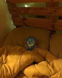 Size: 720x900 | Tagged: safe, artist:mythicalartist_, imported from derpibooru, dragon, baby, baby dragon, bed, blanket, cute, dragons in real life, g5, irl, looking at you, male, photo, pillow, solo, sparky sparkeroni